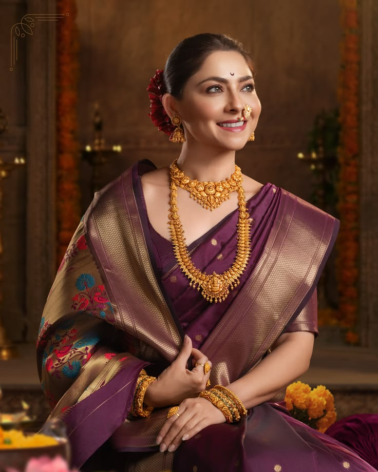Model wearing gold jewellery